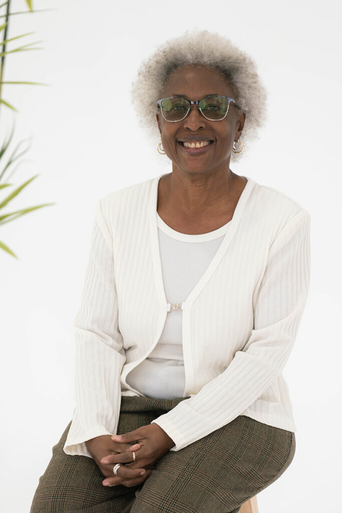Cheryl Macdonald, Operations Manager at an Oklahoma City adult learning center, seated and smiling in a professional portrait.
