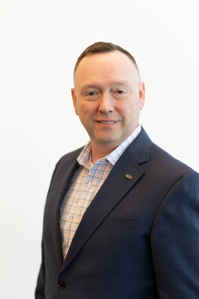 Jeffrey Jalbert, Vice President at Bank First, supports adult education through an Oklahoma City adult learning center.